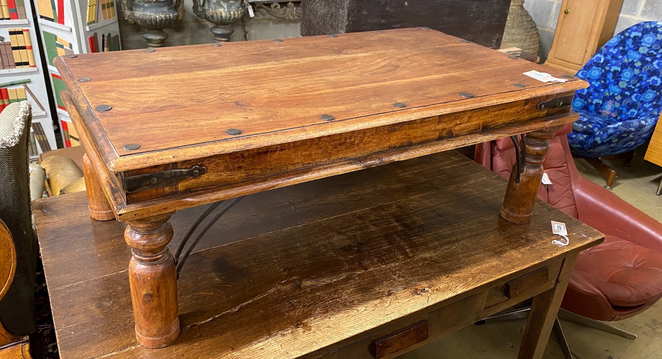 An Indonesian studded rectangular hardwood coffee table, length 108cm, width 60cm, height 40cm